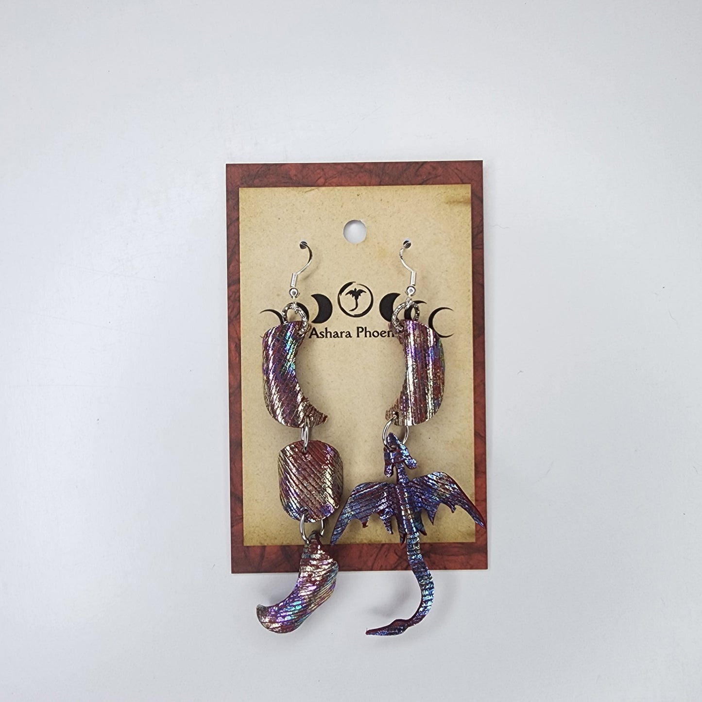 Meltdown Triple Moon And Dragon Earrings