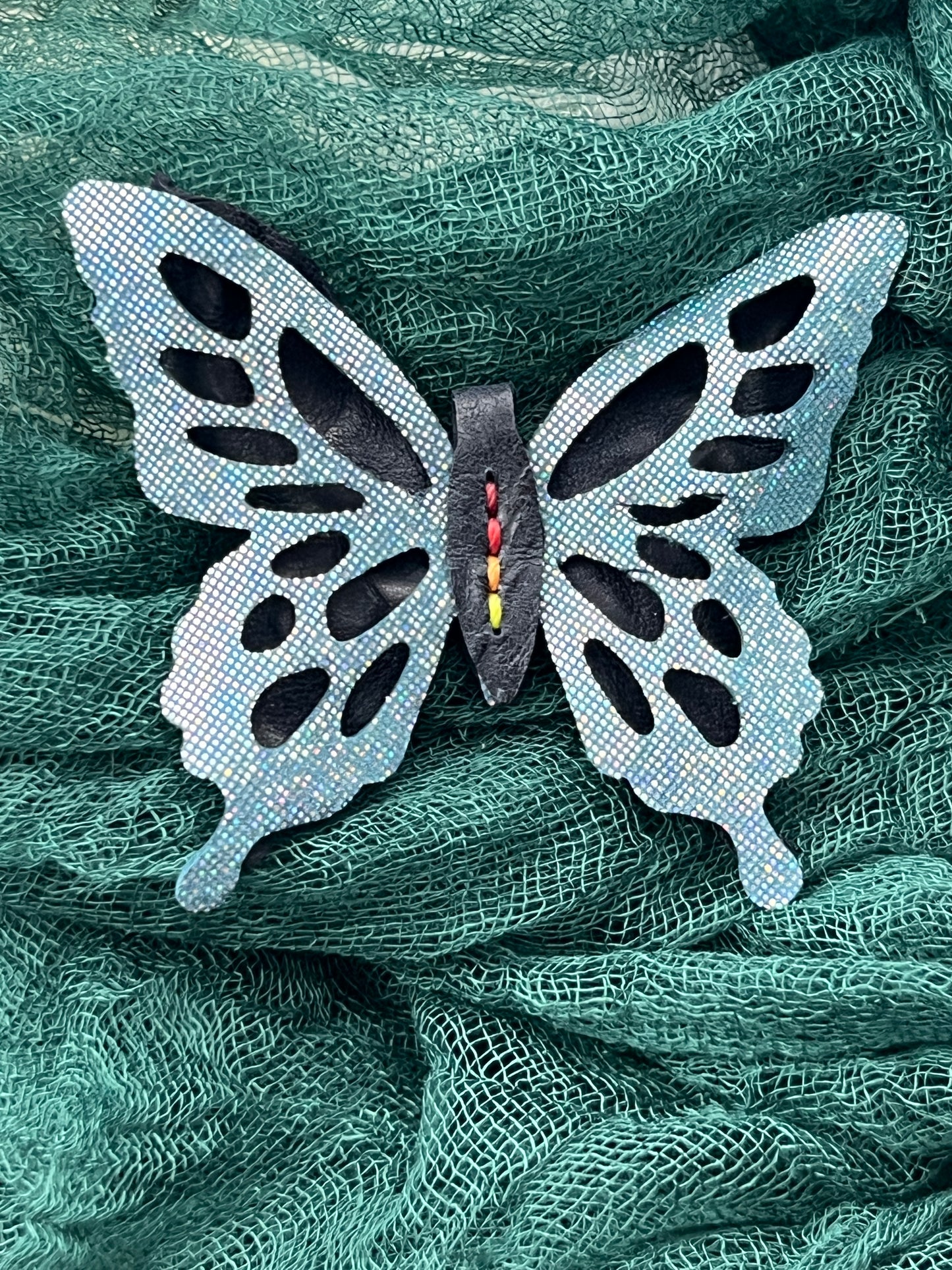 Shimmer Blue over Navy Blue Leather Butterfly Clip